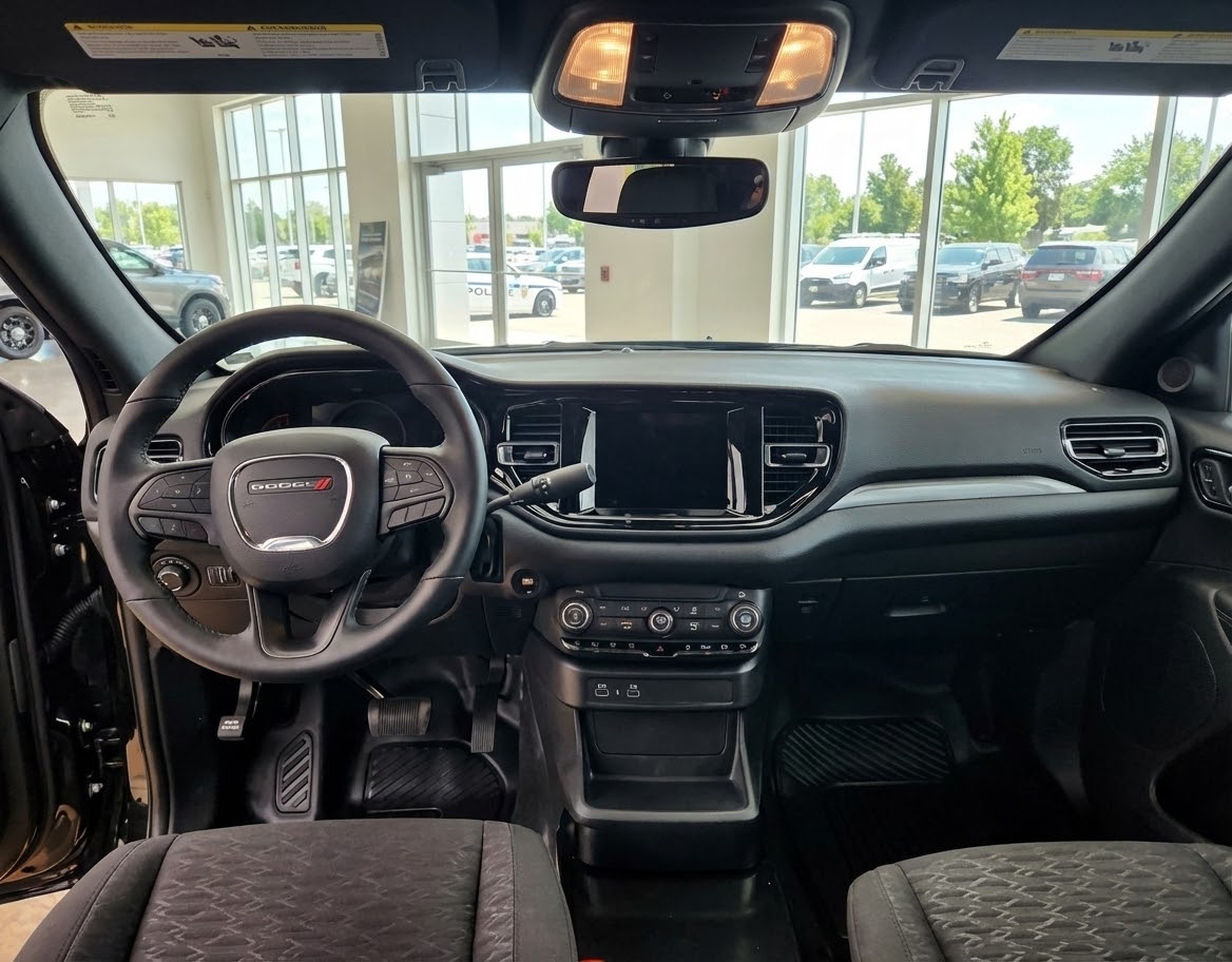 Interior of a Dodge Durango Pursuit police build with dash shifter and equipment